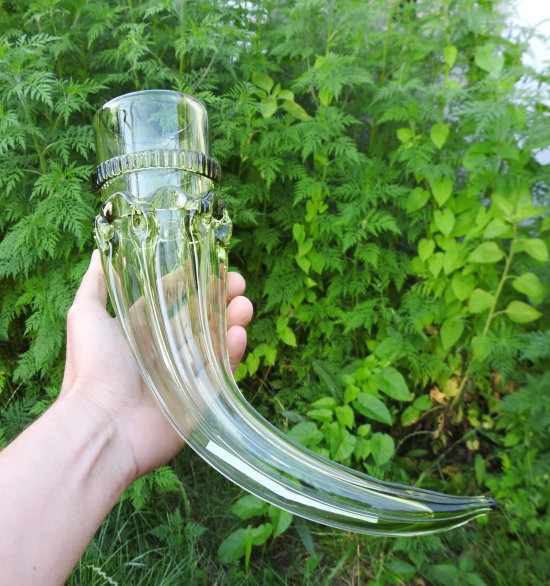 Drinking horn in forest glass