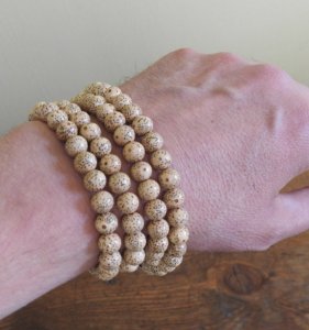 Lotus seed mala with Tibetan mantra beads