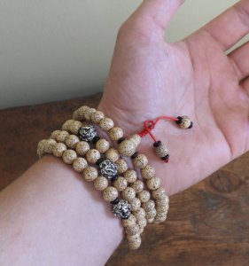 Lotus seed mala with Tibetan mantra beads