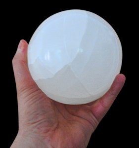 Polished Selenite Globe 12 cm with Mother Earth holder